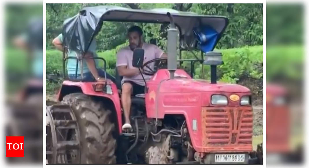 Watch: THIS video of Salman Khan driving a tractor while trying his hands at farming is simply unmissable | Hindi Movie News