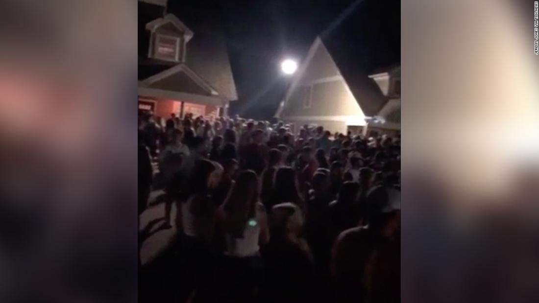 Videos posted to social media show a mostly maskless crowd gathered for a party at off-campus housing near Georgia college