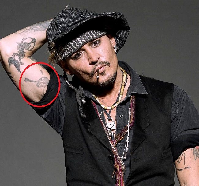 Johnny Depp Tattoos and the hidden meaning behind them