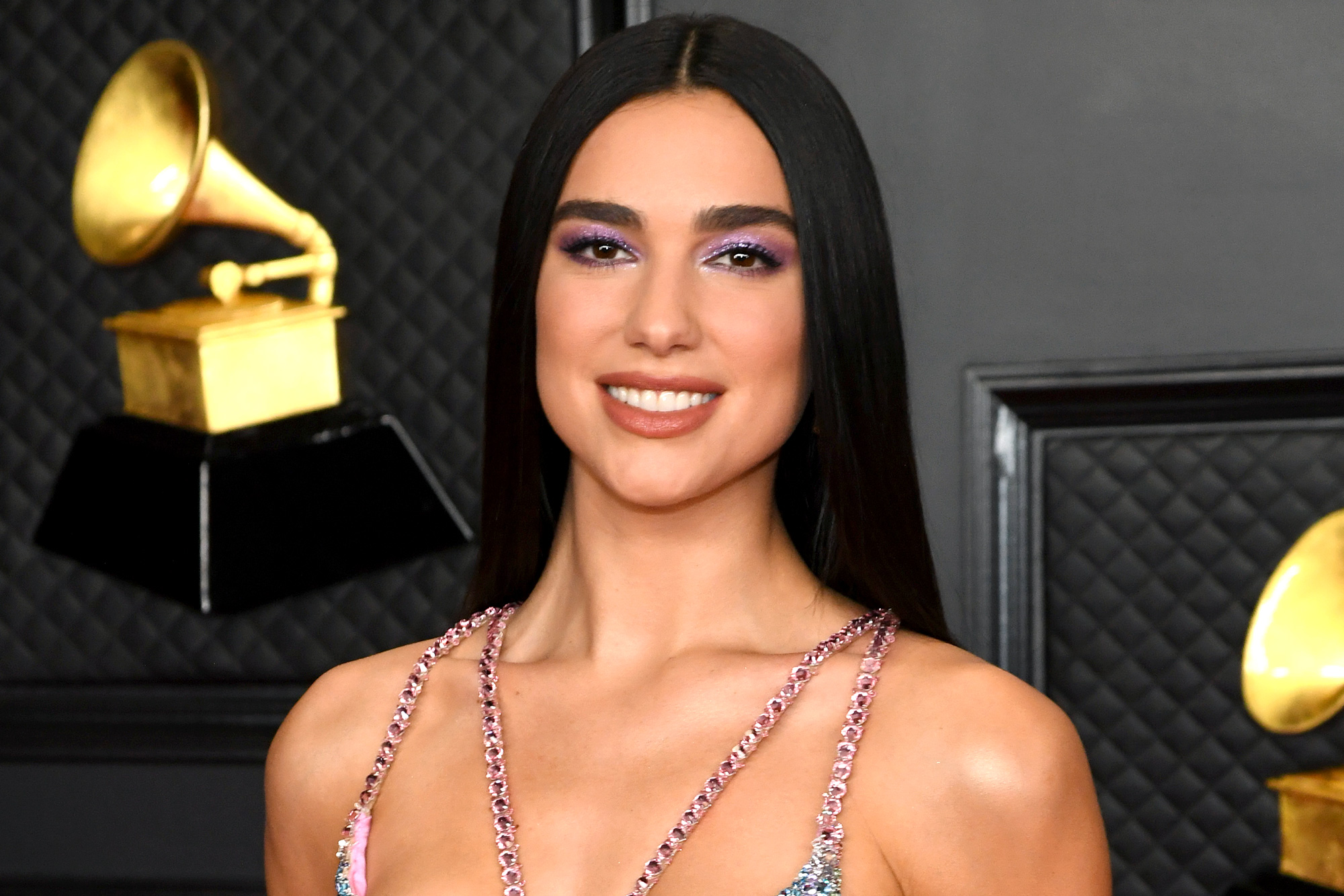 Dua Lipa Chooses Black Lacey Catsuit for Red Carpet: See Pics