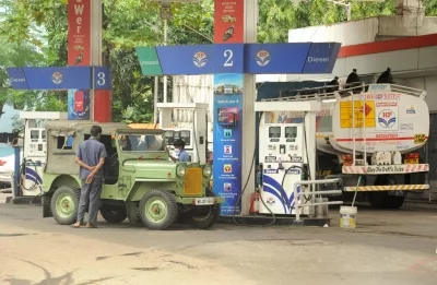 Petrol, diesel prices cut by Rs 2 across India, Petroleum Minister says step shows PM's commitment to people (Lead)