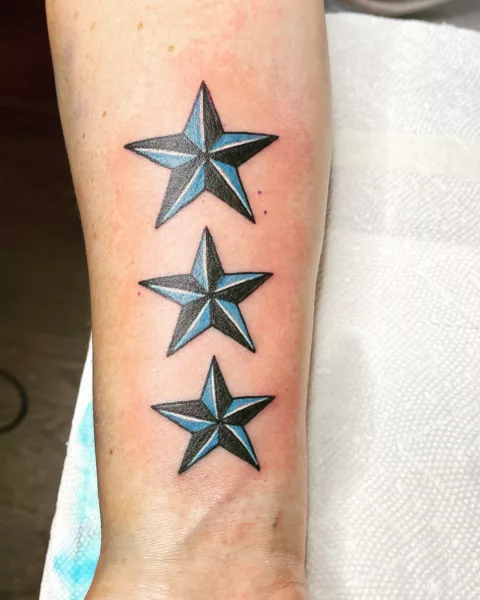Blue and White Nautical Star Tattoo Designs