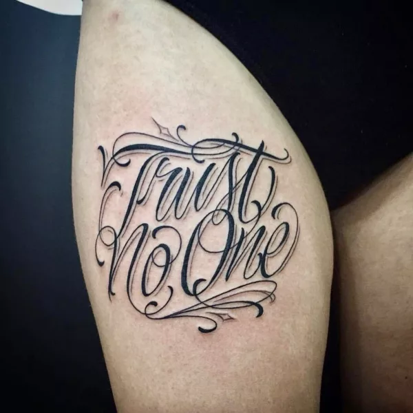 Cursive Trust No One Tattoo Design