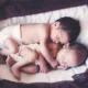 Twins born prematurely at 24 weeks brave hernia, heart defect to survive